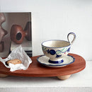 Botanical Ceramic Coffee Cup and Saucer, Pedestal, Loop Handle