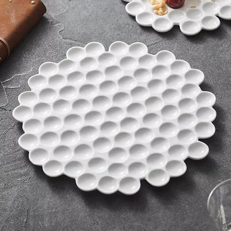 Innovative White Ceramic Plate with Honeycomb Design