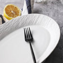 Rustic Textured Oval Plate Perfect for Bold Dining Presentation