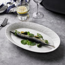 Rustic Textured Oval Plate Perfect for Bold Dining Presentation