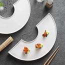 Unique Crescent-Shaped Presentation Plate for Modern Dining