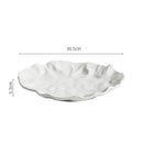 Wavy Rim White Ceramic Plate for Artistic Food Presentation