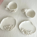 White Floral Ceramic Tea Cup and Saucer Set