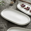 White Oval Serving Plate with Textured Rim for Elegant Dining