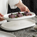 White Oval Serving Plate with Textured Rim for Elegant Dining